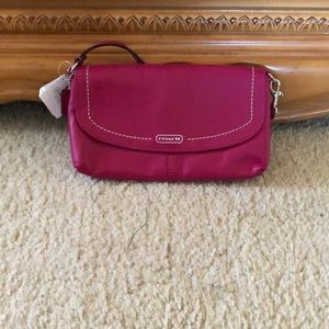 Authentic Coach fuschia leather small bag.